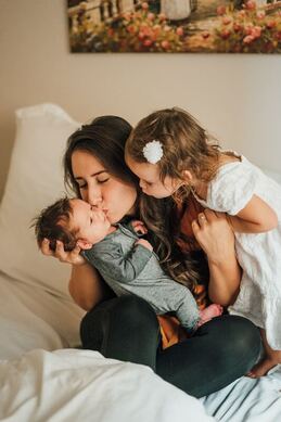 Lots of love for mom during postpartum - Photo by Vincent Delegge on Unsplash